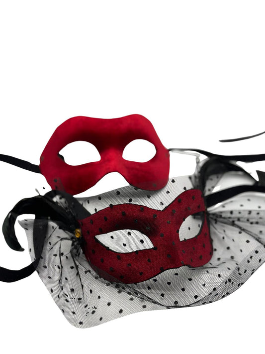 Two Venetian ball masks - man and woman mask - in red velvet. Couple mask red